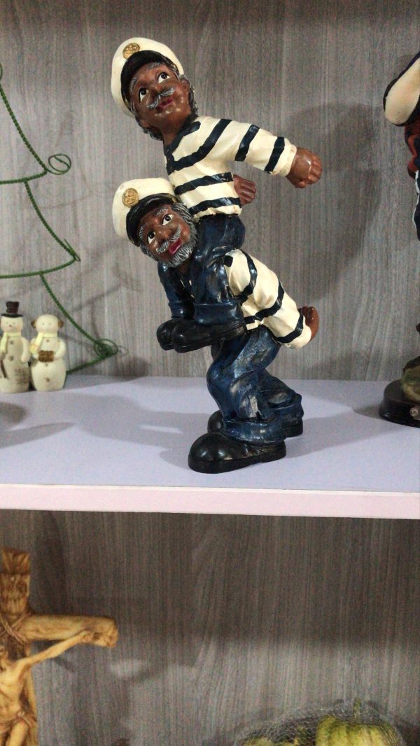 Artwork of man lifting another